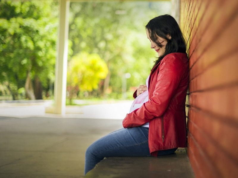 Woman in red jacket