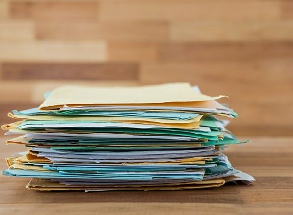 Stack of files on table